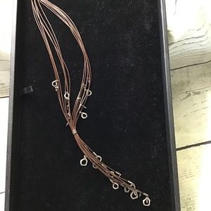 Stella and Dots chocolate  brown necklace with  silver charms